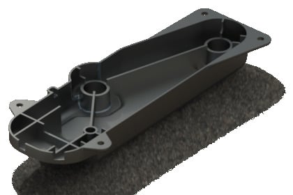 A black plastic object sitting on top of a carpet.